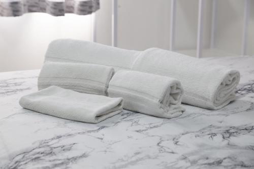 Katil atau katil-katil dalam bilik di 4 Rooms
