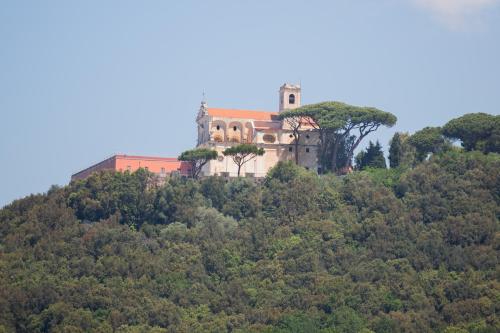 a house on the top of a hill at Tra il Vesuvio e il Mare Apartment in Torre del Greco