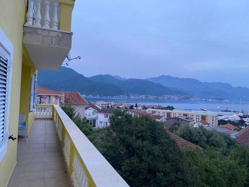 a balcony of a building with a view of the water at Hara Villa in Bijela