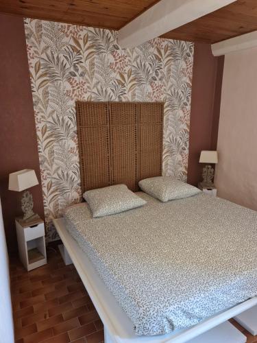 Postel nebo postele na pokoji v ubytování La Cardabelle