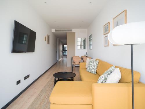 Et opholdsområde på Gran apartamento cerca de playa Las Canteras con gimnasio A3B