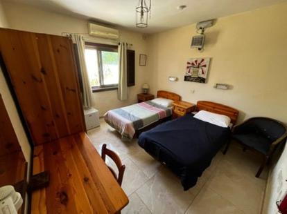 Postel nebo postele na pokoji v ubytování sefranda-Casa di Elena