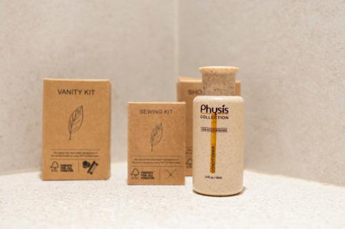 three cardboard boxes sitting next to a bottle of drugs at Aegean Houses in Kos Town