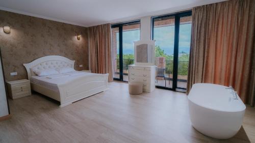 Postel nebo postele na pokoji v ubytování Villa Ikalto