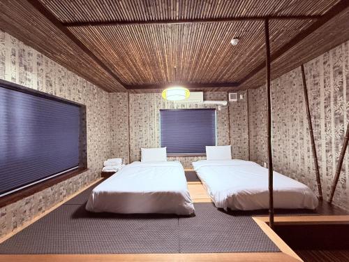 Postel nebo postele na pokoji v ubytování HOTEL COCOA RESORT