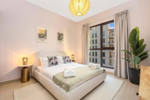 Postel nebo postele na pokoji v ubytování FIRST CLASS 1BR Classic Luxe Getaway