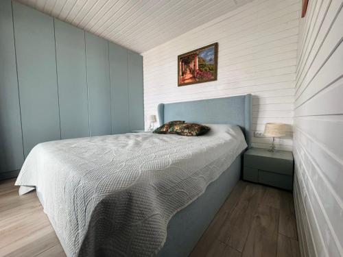 Ένα ή περισσότερα κρεβάτια σε δωμάτιο στο Camping Gardenia - Bungalow SeaBed
