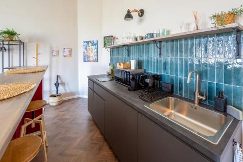 Kuchyň nebo kuchyňský kout v ubytování Budapest Central Artpark Suites