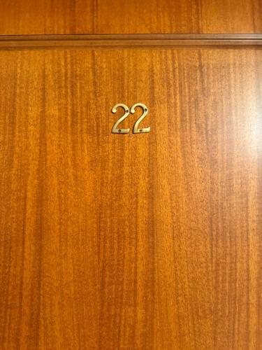 a wooden door with the number on it at Archontiko tou Krommyda in Elati Trikalon