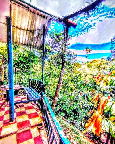 a painting of a porch with a swing at Green porticos villa munnar #MUNNAR in Anachal