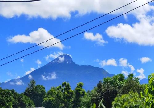 a view of a mountain in the distance at WauTaMaDuNi Rental House in Nkunjila