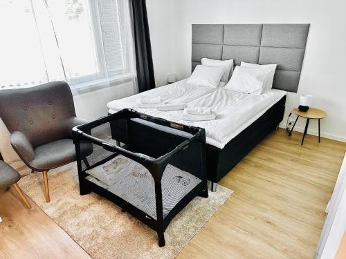 Postel nebo postele na pokoji v ubytování Katariina Apartments