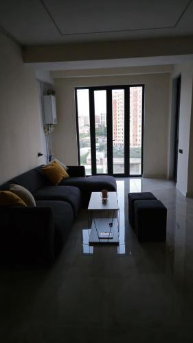 Ruang duduk di Cozy apartament near to center