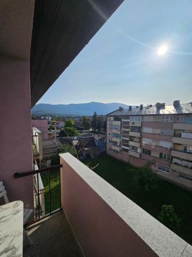 a balcony with a view of a building at Apartman Annie in Bihać