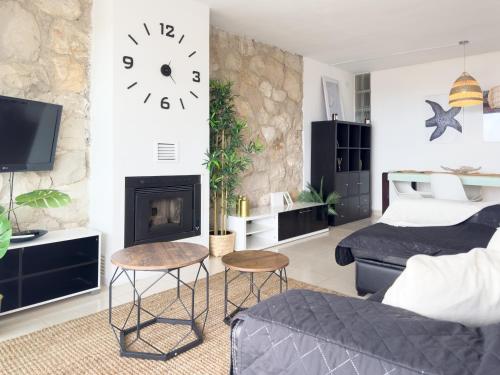 TV a/nebo společenská místnost v ubytování Hauzify I Apartament Cala Crancs