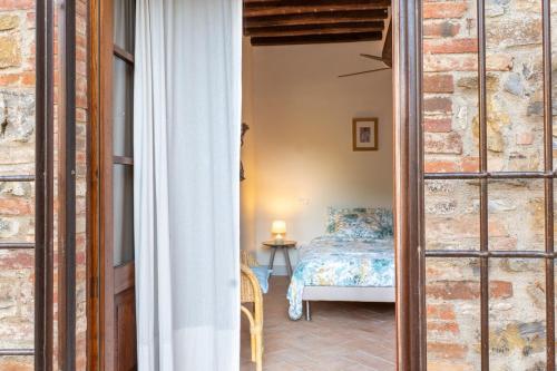 a view of a bedroom with a bed in a room at Minimal & Modern Home - In Arceno Estate in Villa dʼArceno