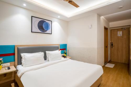 FlxHo Cyber One - Hotel And Banquet- DLF Cyber Cityにあるベッド
