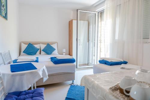 Postel nebo postele na pokoji v ubytování Guest House Vucicevic