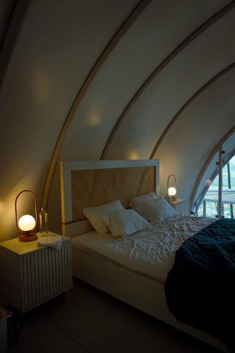 Una cama o camas en una habitación de Cocoon-coxcargill