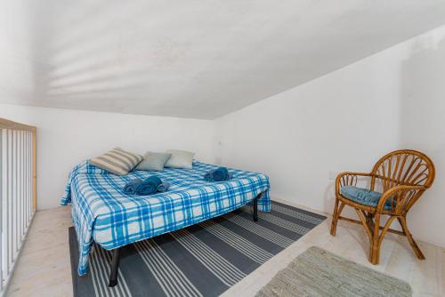 Ένα ή περισσότερα κρεβάτια σε δωμάτιο στο Casa Vacanza- Sa Nue