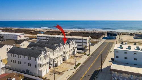 an aerial view of a building next to the beach at 509 E 15Th Ave, Unit F in North Wildwood
