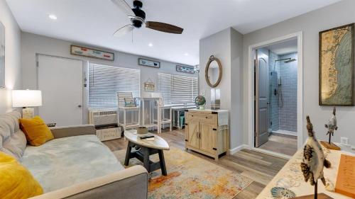 a living room with a couch and a table at 510 E 8Th Ave, Unit 101 in North Wildwood