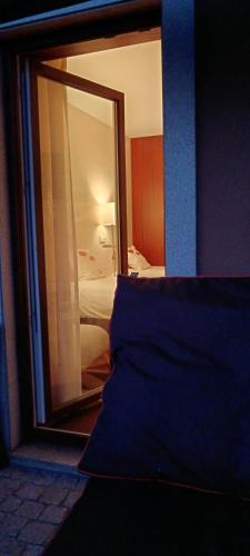 Katil atau katil-katil dalam bilik di Moimenta Guest House