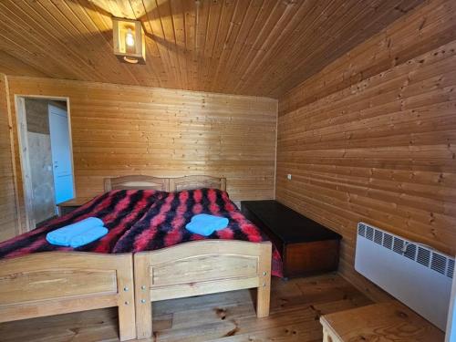 Postel nebo postele na pokoji v ubytování Cottages SHIKHRA - კოტეჯები შიხრა