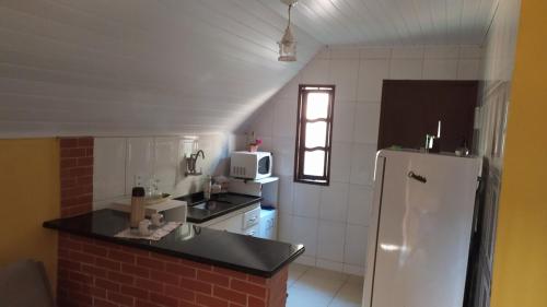 Dapur atau dapur kecil di Aconchego da Montanha - chalé