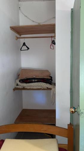 a room with two bunk beds in a room at Casa completa Balneario Argentino in Balneario Argentino