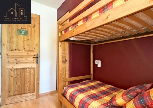 Ένα ή περισσότερα κρεβάτια σε δωμάτιο στο 3 chambres - skis au pied