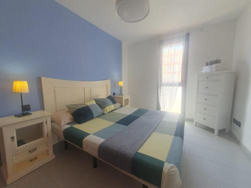 Postel nebo postele na pokoji v ubytování alquilaencanarias Duplex beach Cabezo terrace and pool