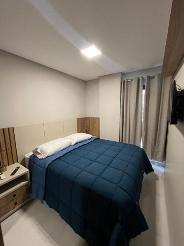 Postel nebo postele na pokoji v ubytování Edifício Rigiero