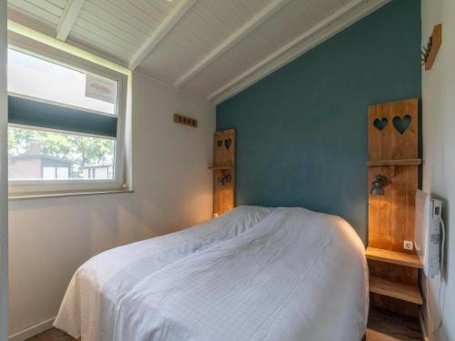 Ένα ή περισσότερα κρεβάτια σε δωμάτιο στο Beachside holiday home