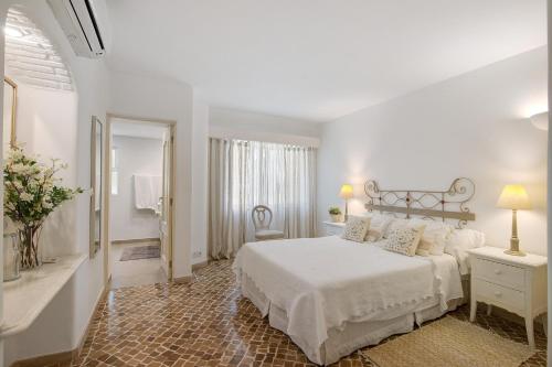 Postel nebo postele na pokoji v ubytování Casa Isabella
