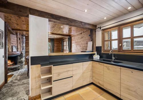 Kuchyň nebo kuchyňský kout v ubytování Chalet Charline