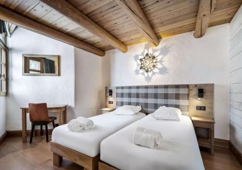 Postel nebo postele na pokoji v ubytování Chalet Charline
