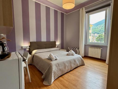 Postel nebo postele na pokoji v ubytování Evy’s Rooms
