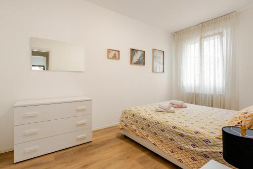 Giường trong phòng chung tại Vittoria Living Studio