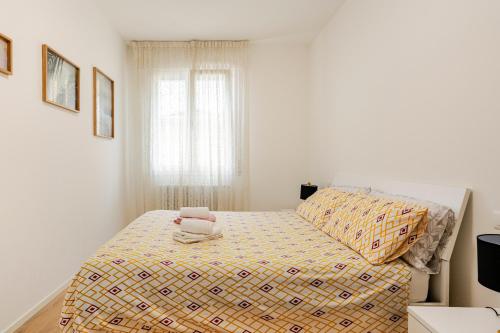 Ένα ή περισσότερα κρεβάτια σε δωμάτιο στο Vittoria Living Studio