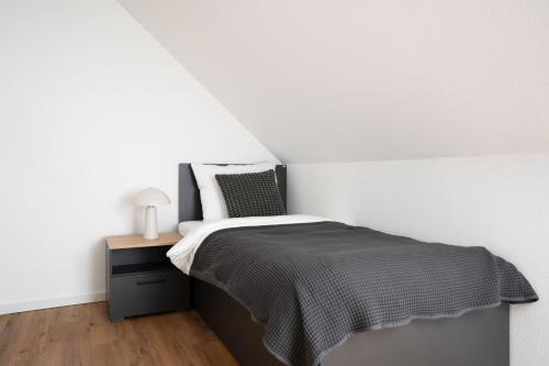 Katil atau katil-katil dalam bilik di Schöne Apartments in Lohne I home2share