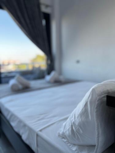a close up of a bed in a room at Uka apartment in Nea Iraklia