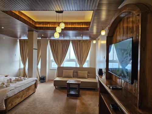 Μια τηλεόραση ή/και κέντρο ψυχαγωγίας στο Hotel Golden Orchid
