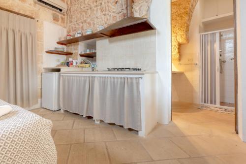 Kuchyň nebo kuchyňský kout v ubytování Borgo del Sole Salento
