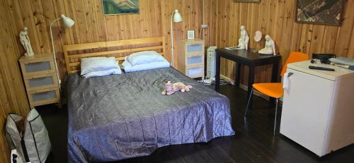 Postel nebo postele na pokoji v ubytování Mökki ympärivuotinen, Tammela