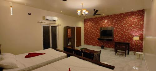 Postel nebo postele na pokoji v ubytování peacevillageresort