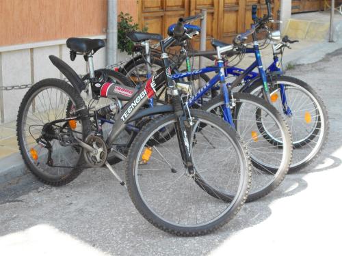 a group of bikes parked next to each other at Pamir Guest House in Shipkovo
