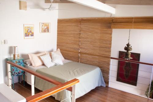 Ένα ή περισσότερα κρεβάτια σε δωμάτιο στο Loft PH, con patio