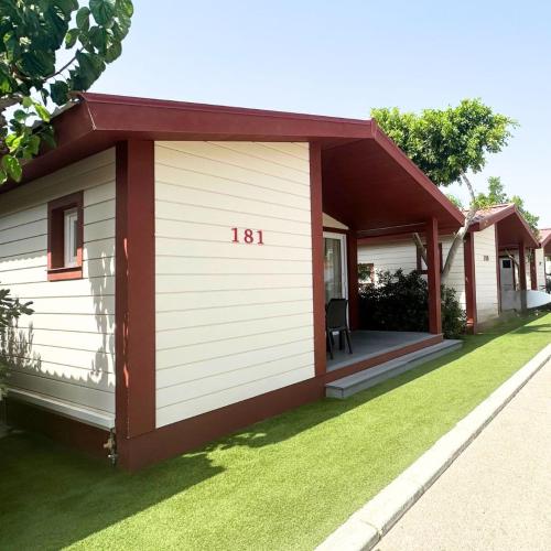 a small house with the number on it at Alannia Guardamar in Guardamar del Segura