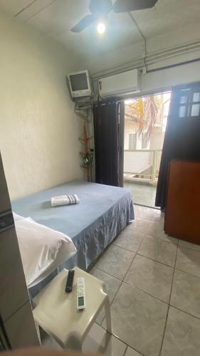 Postel nebo postele na pokoji v ubytování Pousada e Alojamento Engenho de Itaguaí
